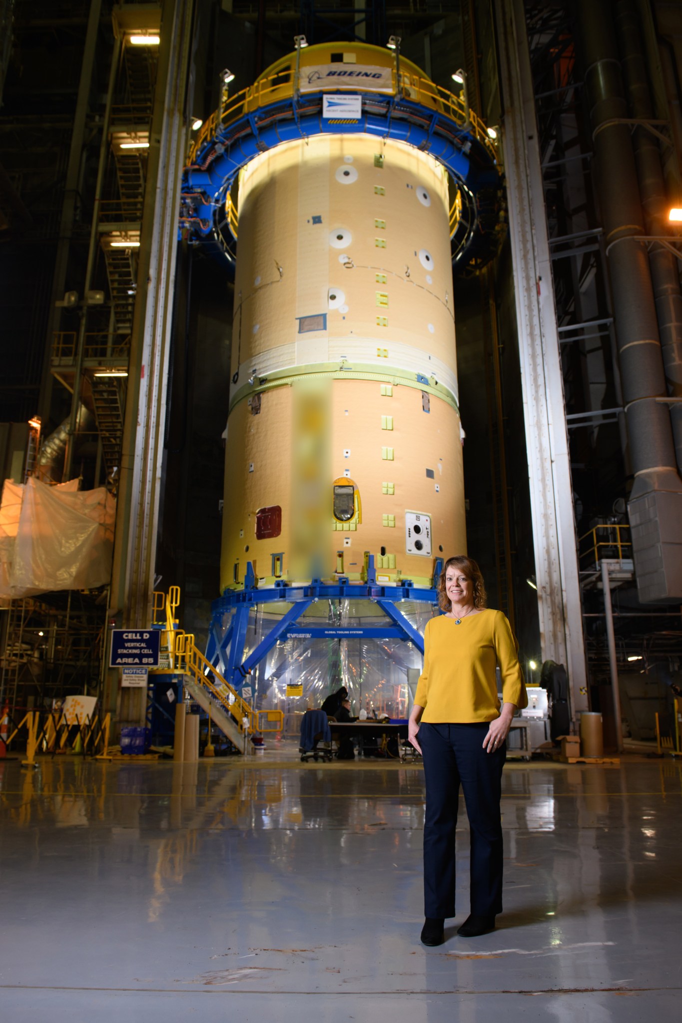 NASA Marshall's Julie Bassler in front of SLS Core Stage