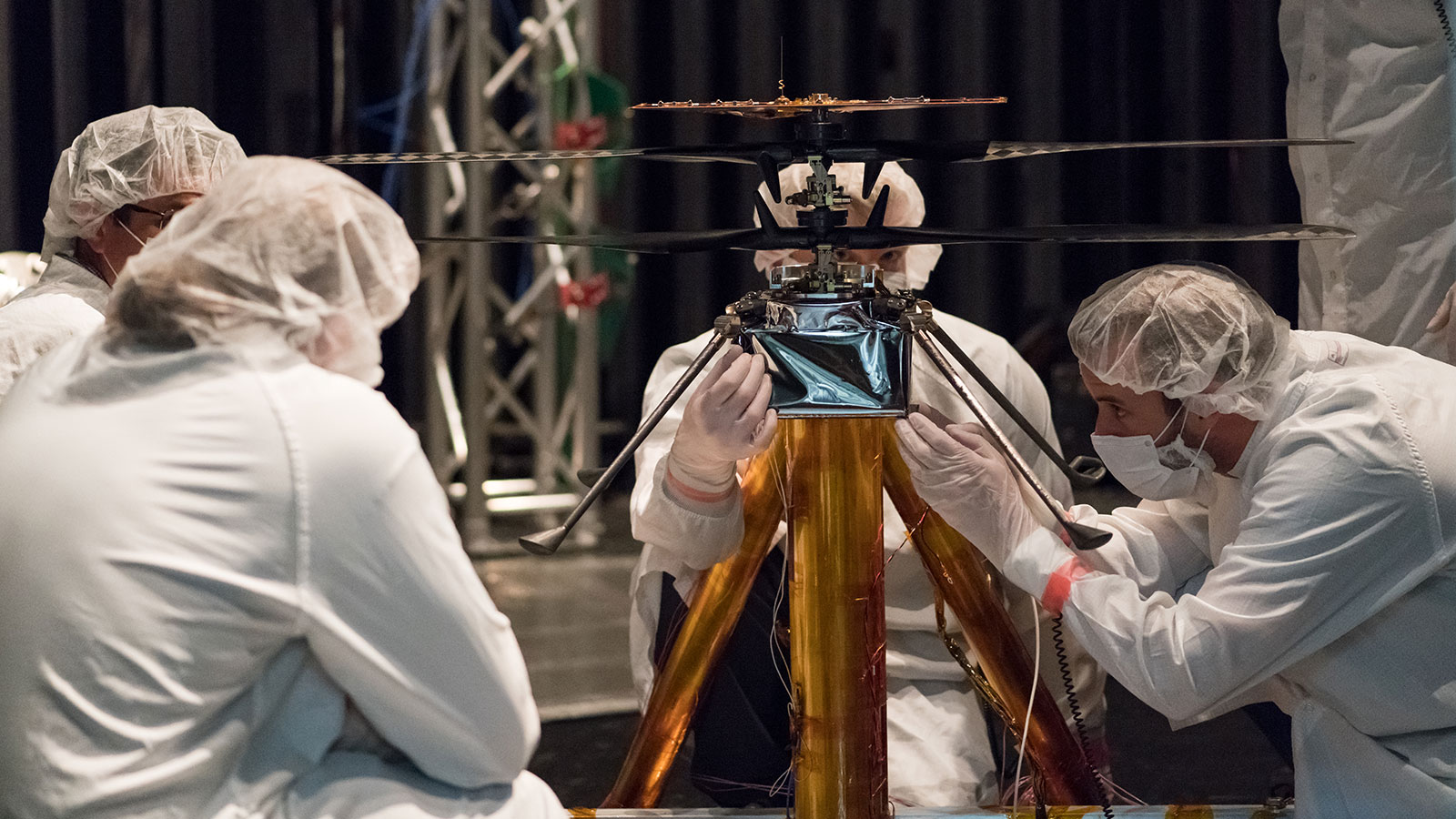 NASA Mars Helicopter team members work the flight model