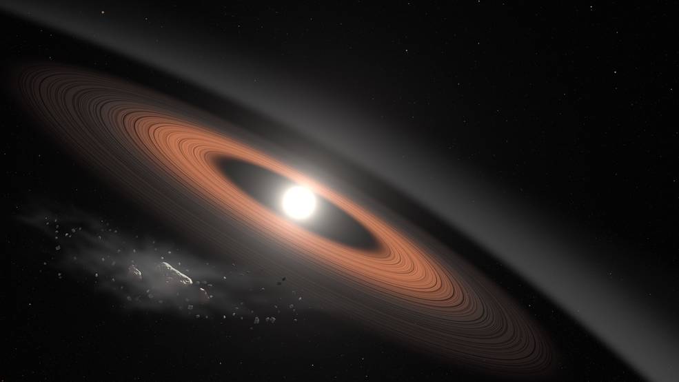 An illustration shows a white dwarf surrounded by brown dust rings with an swarm of asteroid fragments just outside the rings in the lower left