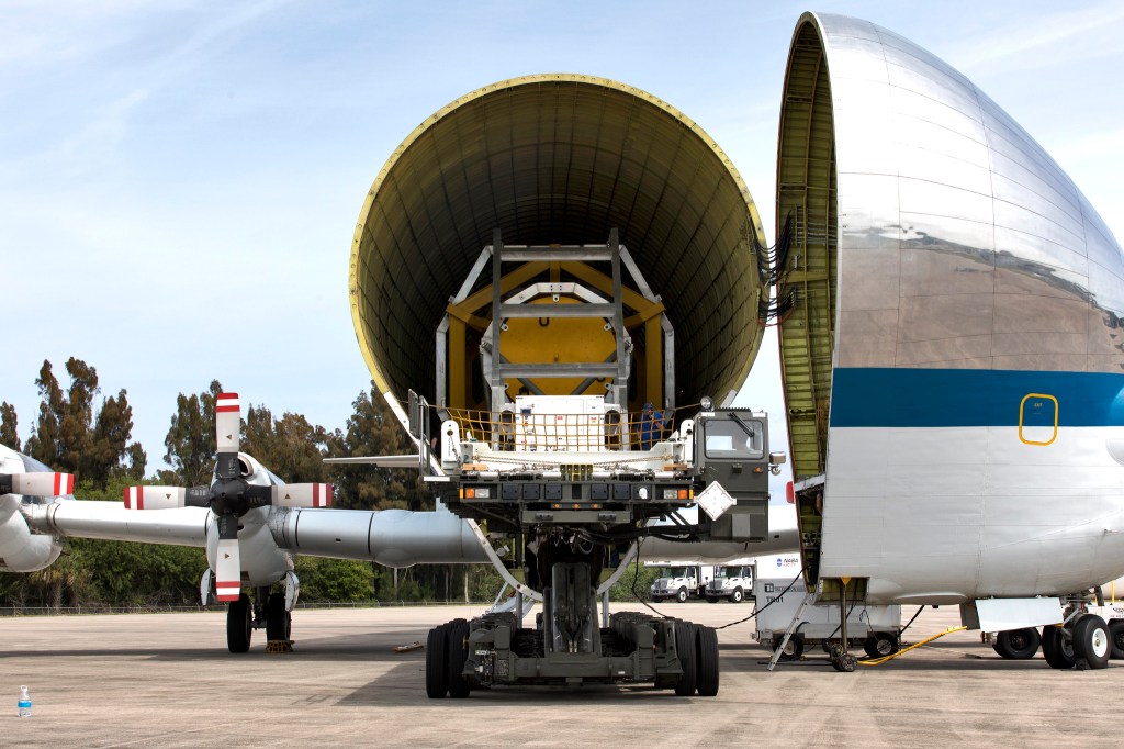 Fit check of the Orion horizontal transporter fixture in NASA's Super Guppy aircraft at Kennedy Space Center in Florida.
