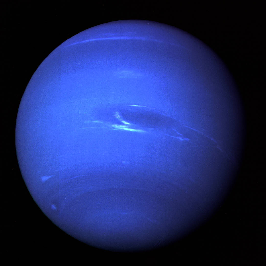 Image of Neptune, a dark blue planet 