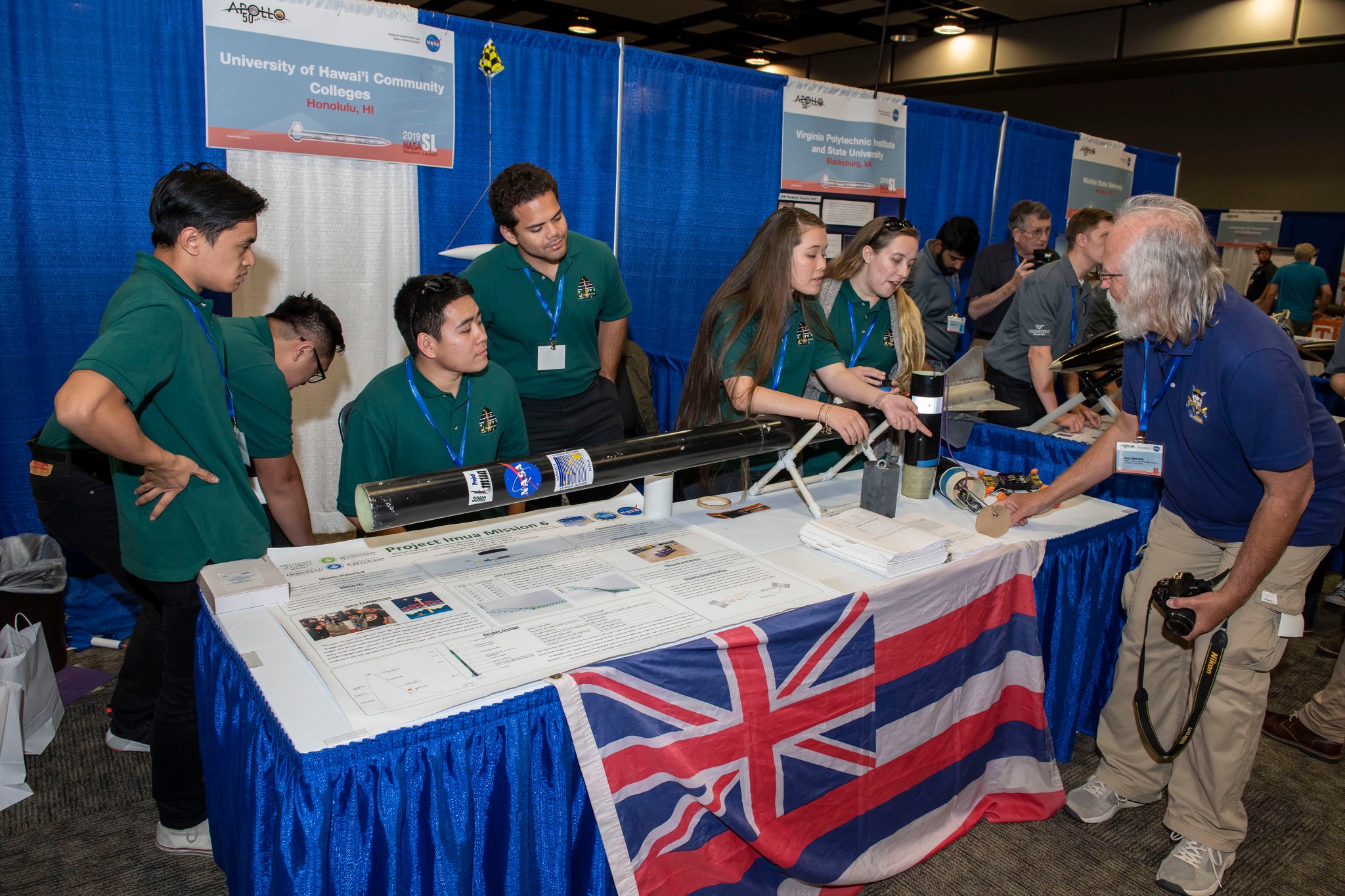 The University of Hawaii Community Colleges team shows off their rocket and payload at the annual Student Launch Rocket Fair.