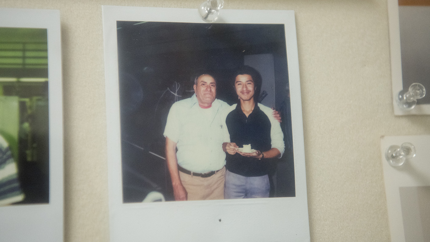 Avalos, right, with a colleague in the machine shop as a new hire in the early 1980s