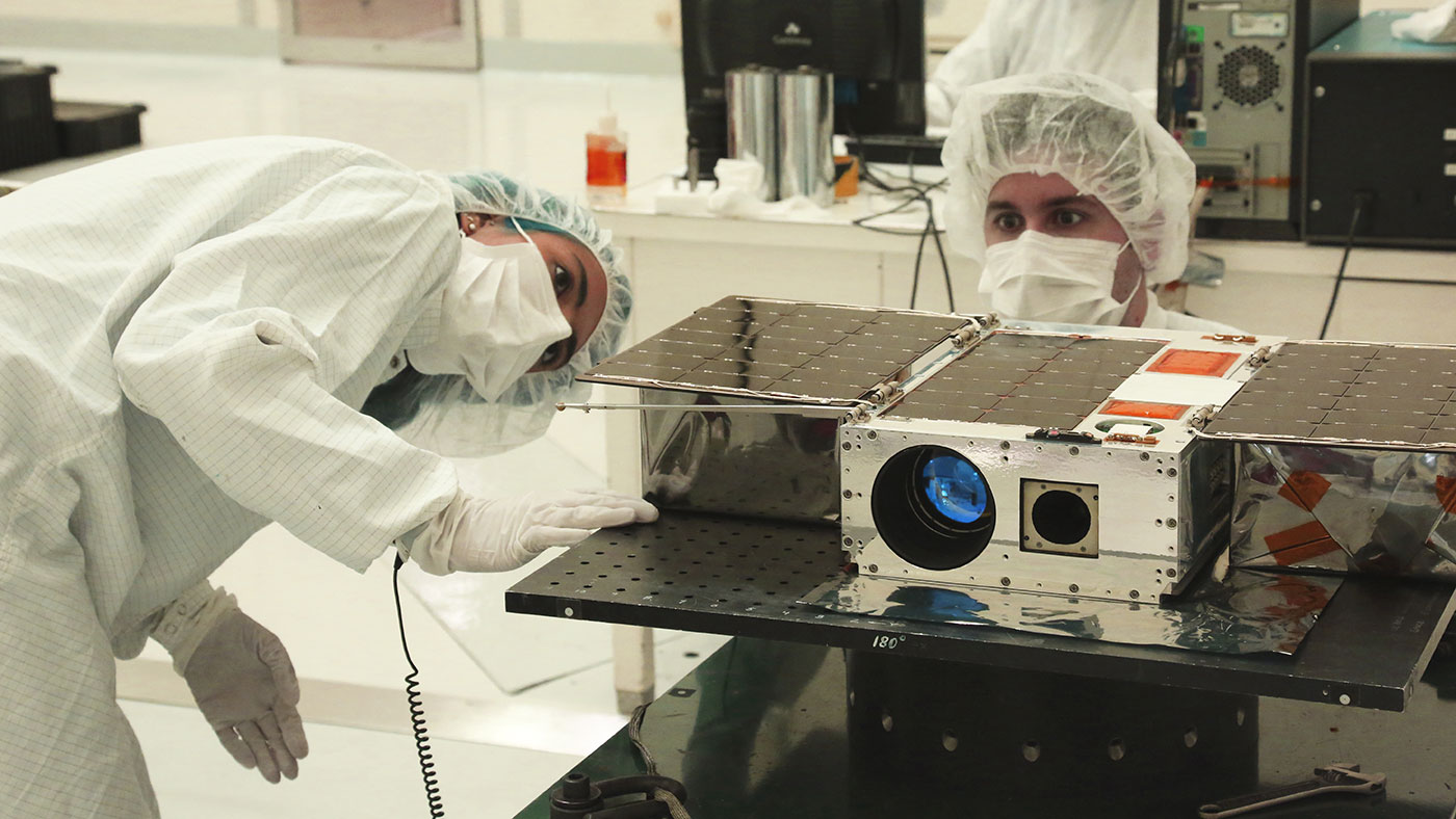 Electrical Test Engineer Esha Murty (left) and Integration and Test Lead Cody Colley (right)