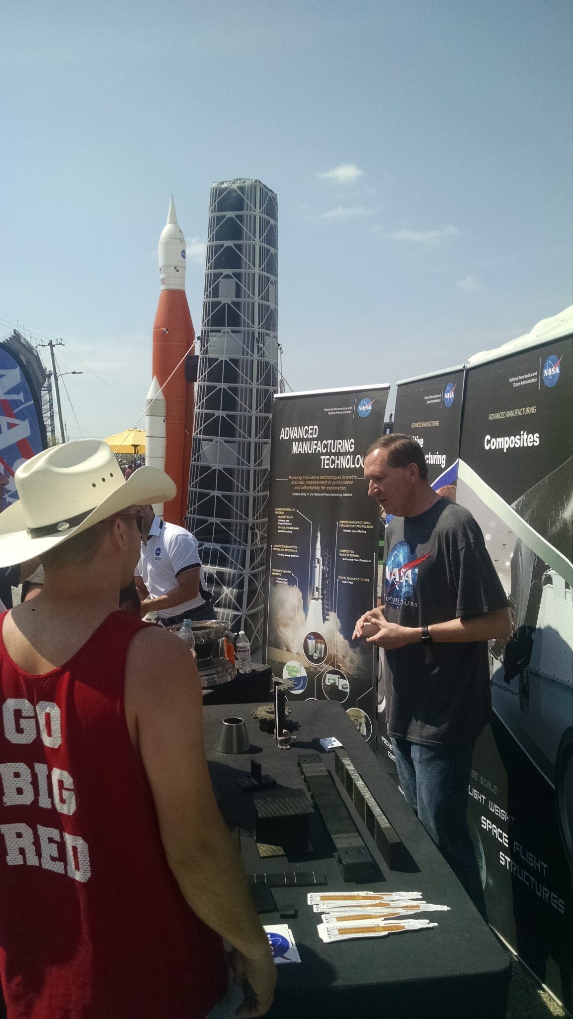 NASA Marshall Space Flight Center Chief Technologist John Dankanich, right, talks with race fans at Talladega Superspeedway.
