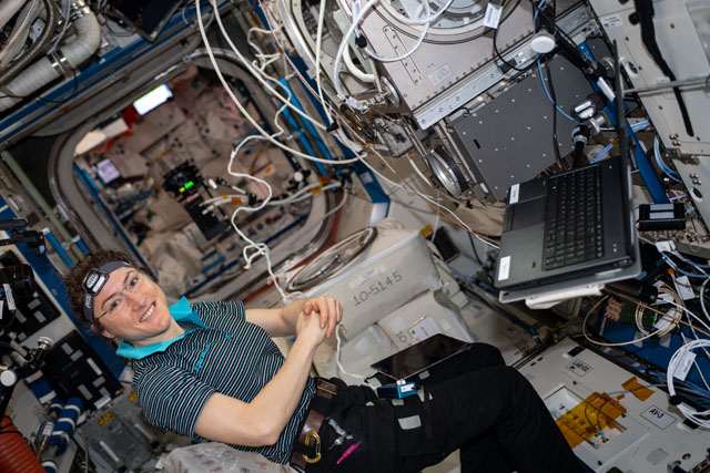 NASA astronaut Christina Koch sets up Fiber Optic Production, an investigation to create optical fibers in microgravity that may exhibit superior quality to those produced on Earth. Image Credit: NASA