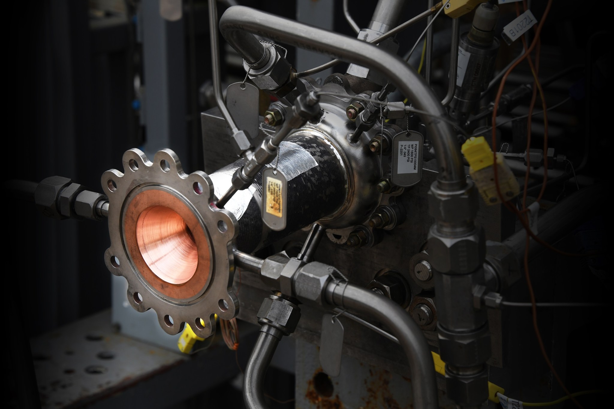 A 3D-printed rocket engine combustion chamber awaiting hot-fire testing at NASA’s Marshall Space Flight Center.