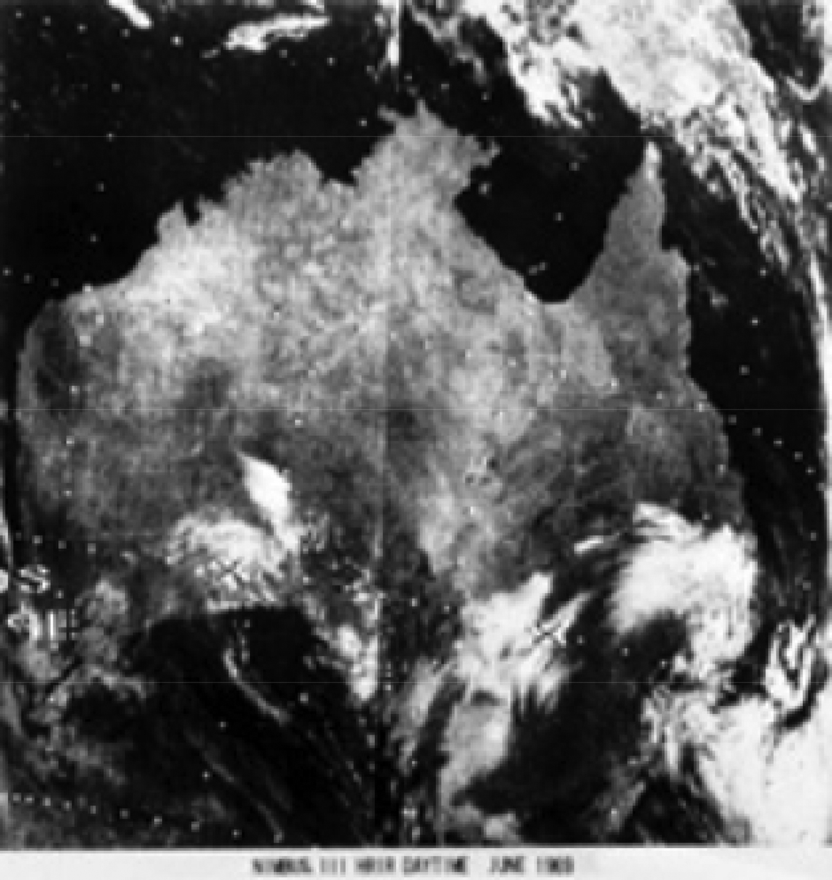 Nimbus-3 view of Australia from 1969. The image looks very old, in black and white. It's very grainy. 