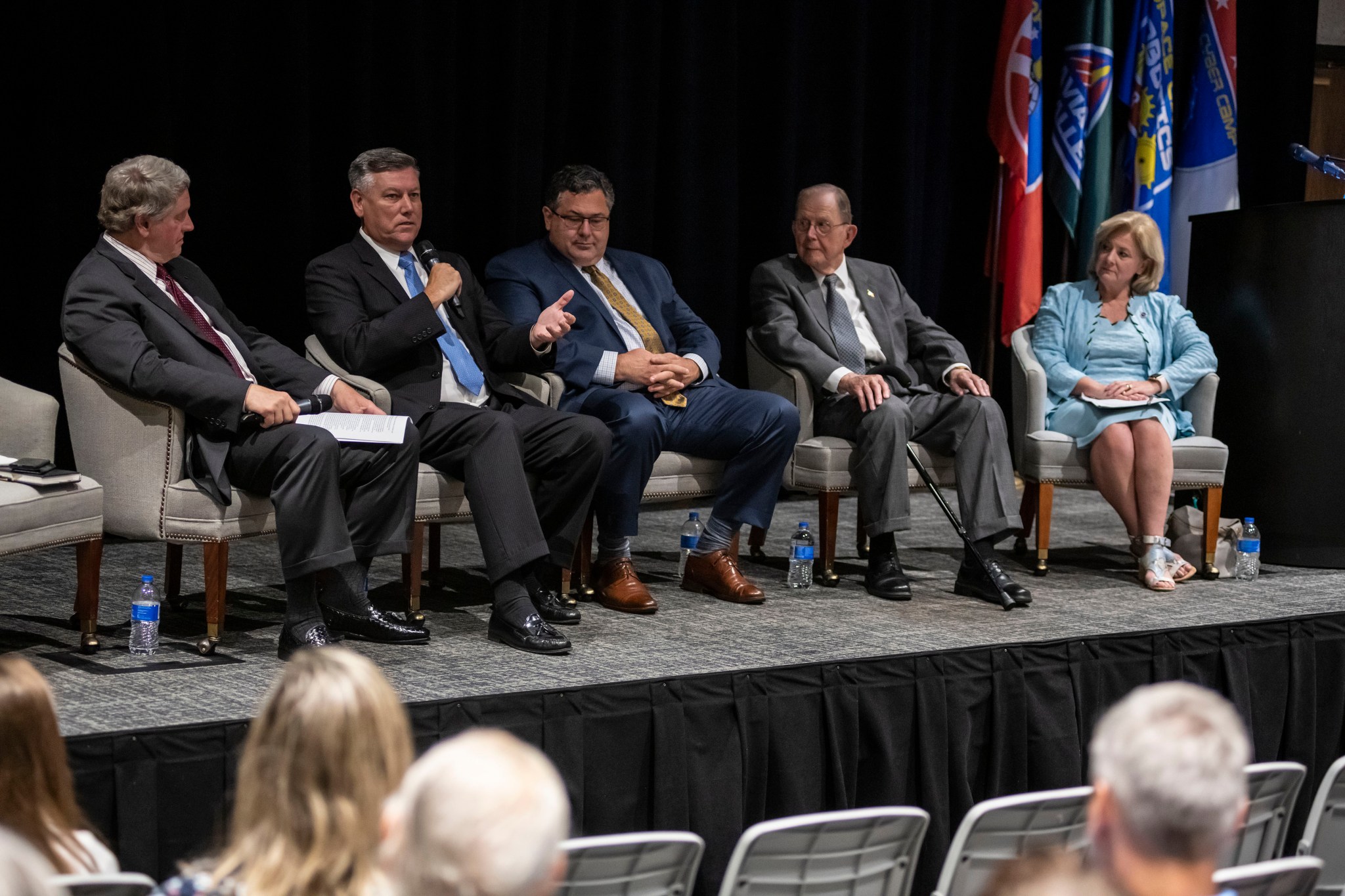 The Pass the Torch center panel featured, from left, Gene Goldman, Patrick Scheuermann, Todd May, William Lucas, and Jody Singer