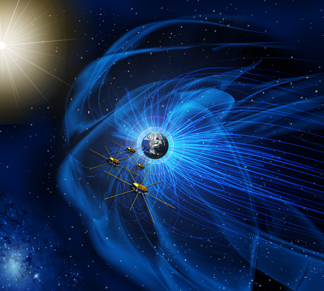 Artist conception of Earth surrounded by its magnetic field, depicted by curving blue lines. There are four identical small spacecraft moving away from earth. They have a round center and eight bars coming from the center.