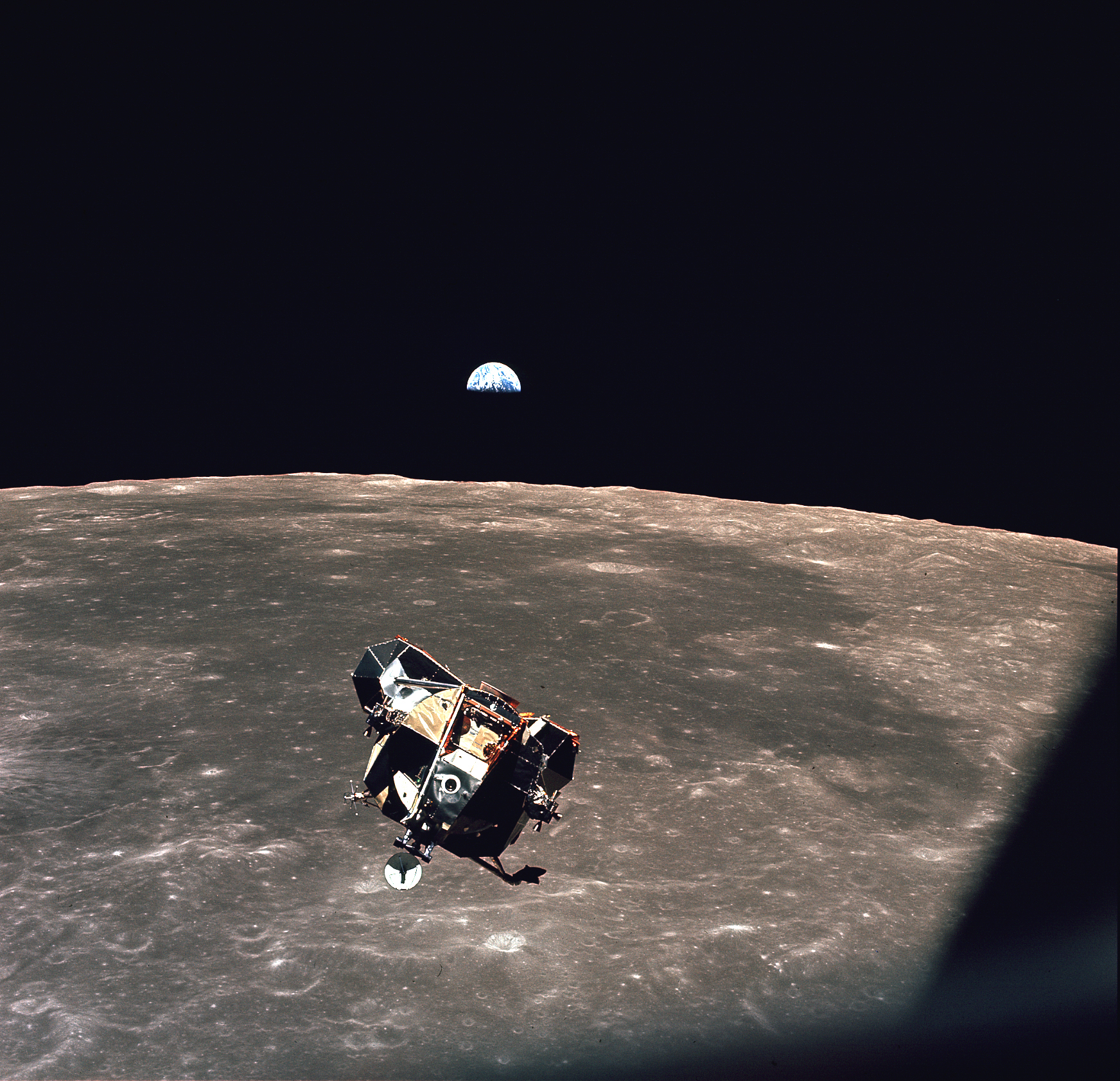 The Apollo 11 lunar module, the Moon, and the Earth