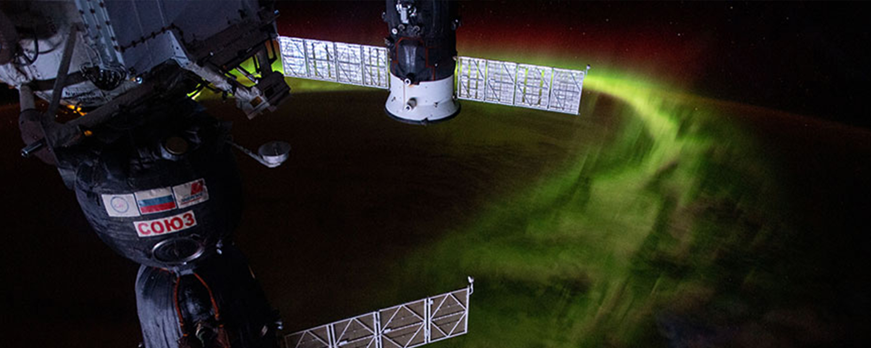 Aurora from space with spacecraft