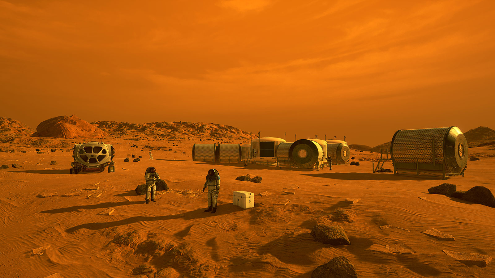 This artist's concept depicts astronauts and human habitats on Mars