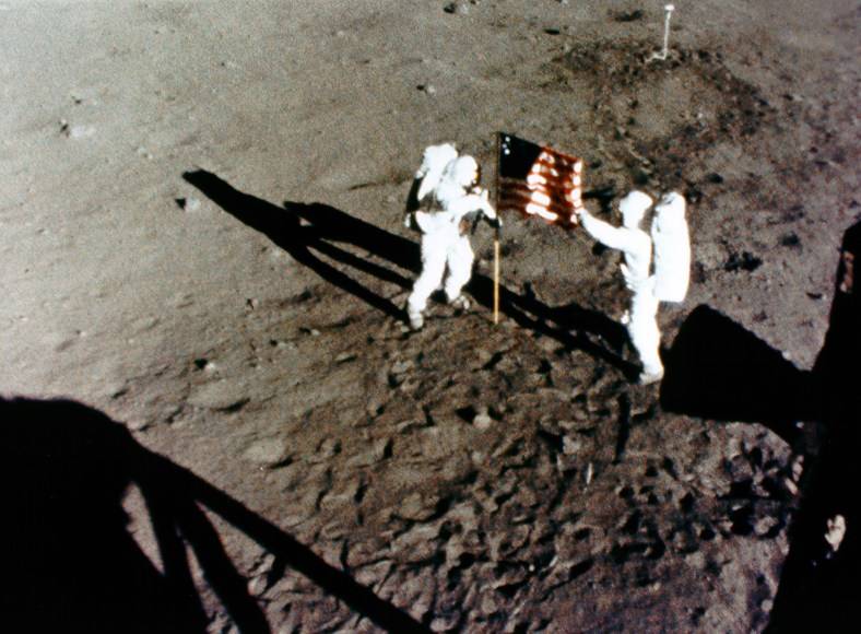 apollo_11_armstrong_aldrin_setting_up_flag_frame_from_16_mm