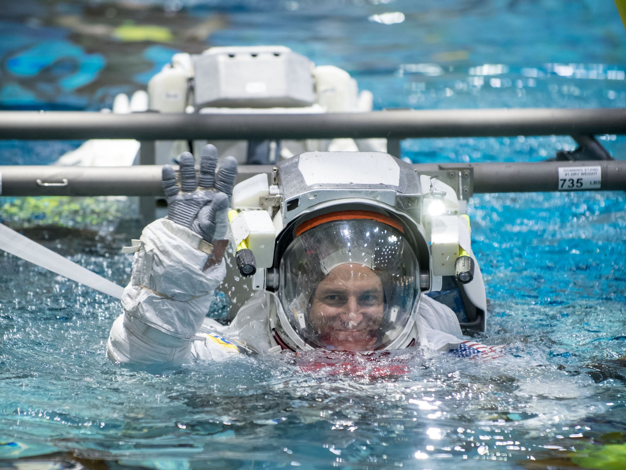 NASA astronaut Morgan enters the Neutral Buoyancy Lab in preparation for space flight activities.