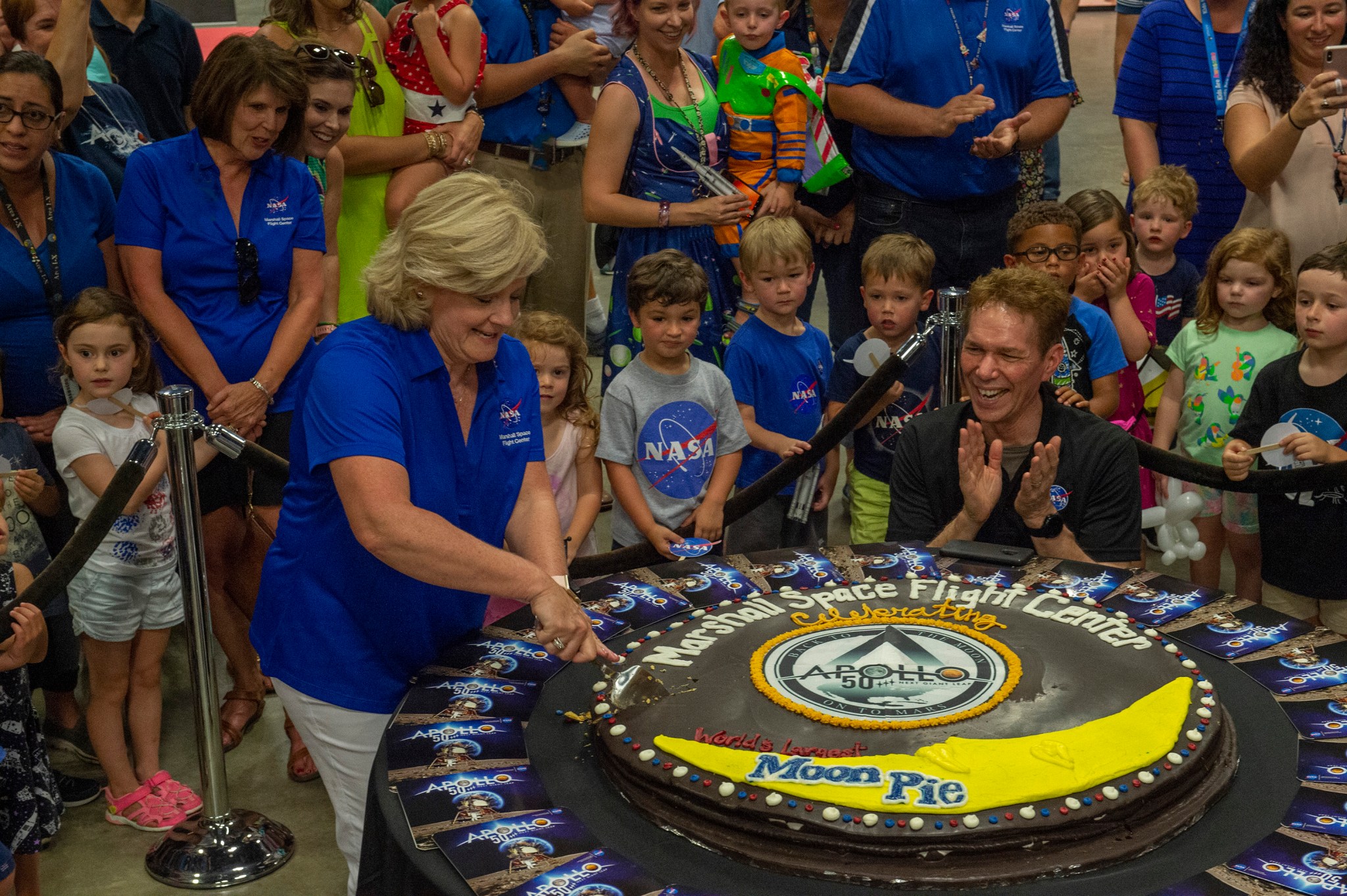 Marshall Director Jody Singer cuts a MoonPie measuring 4 feet in diameter, the largest ever made.