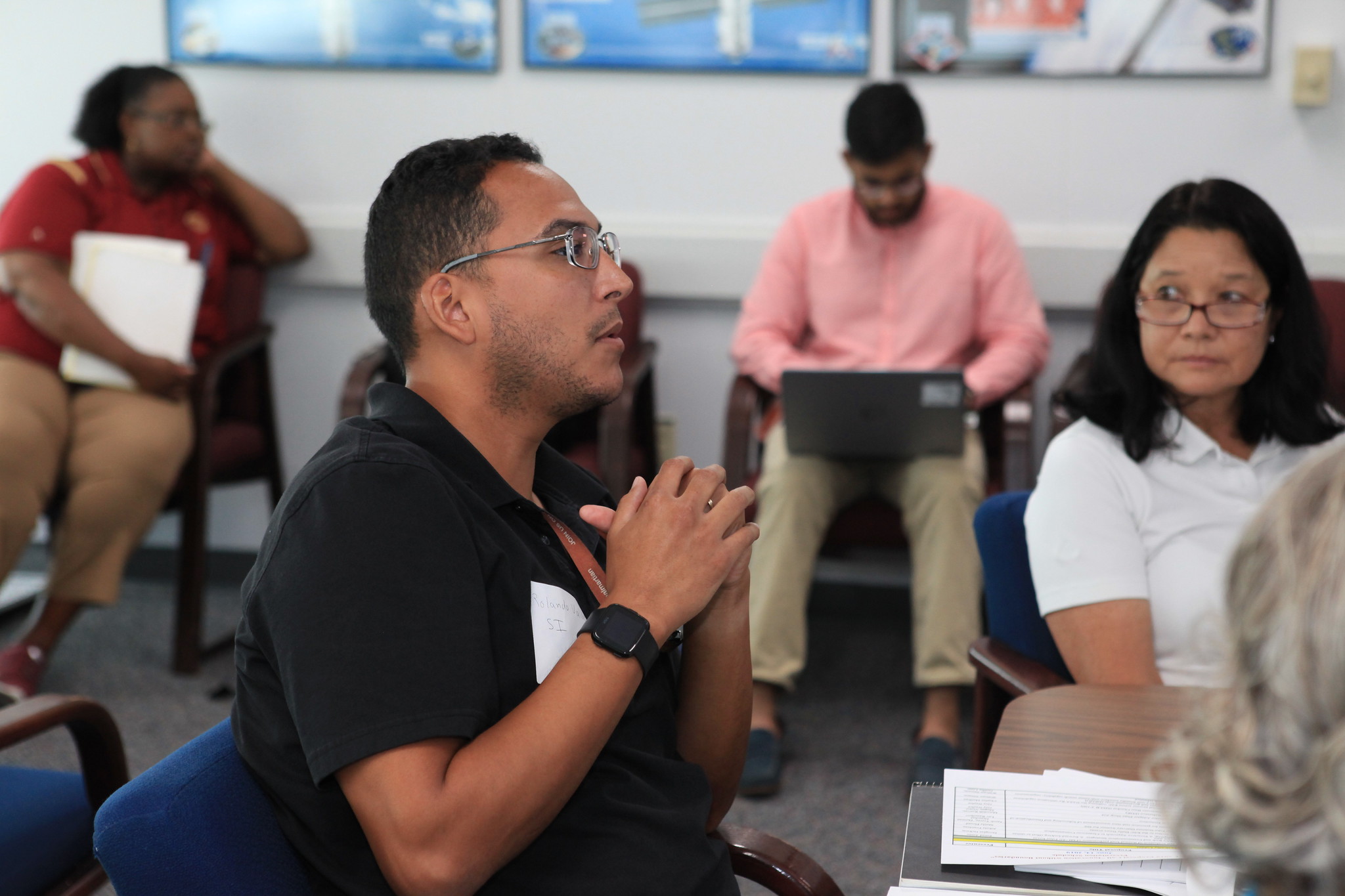 Rolando Valdez, a Kennedy employee, gives feedback to participants during the 2019 Innovation Without Boundaries event.