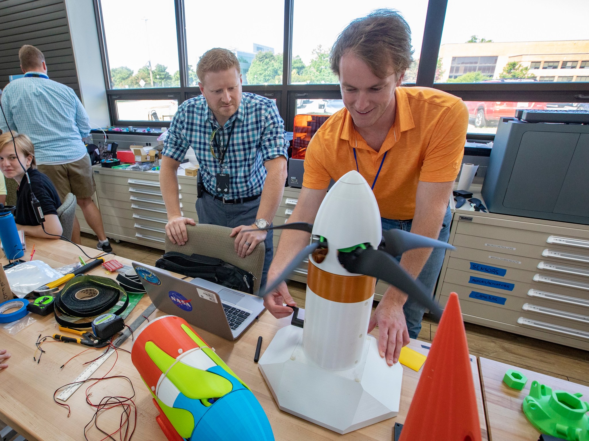 Aerospace engineer Brandon Litherland of Langley’s Aeronautics Systems Analysis Branch shows off what he made at the MakerSpace.