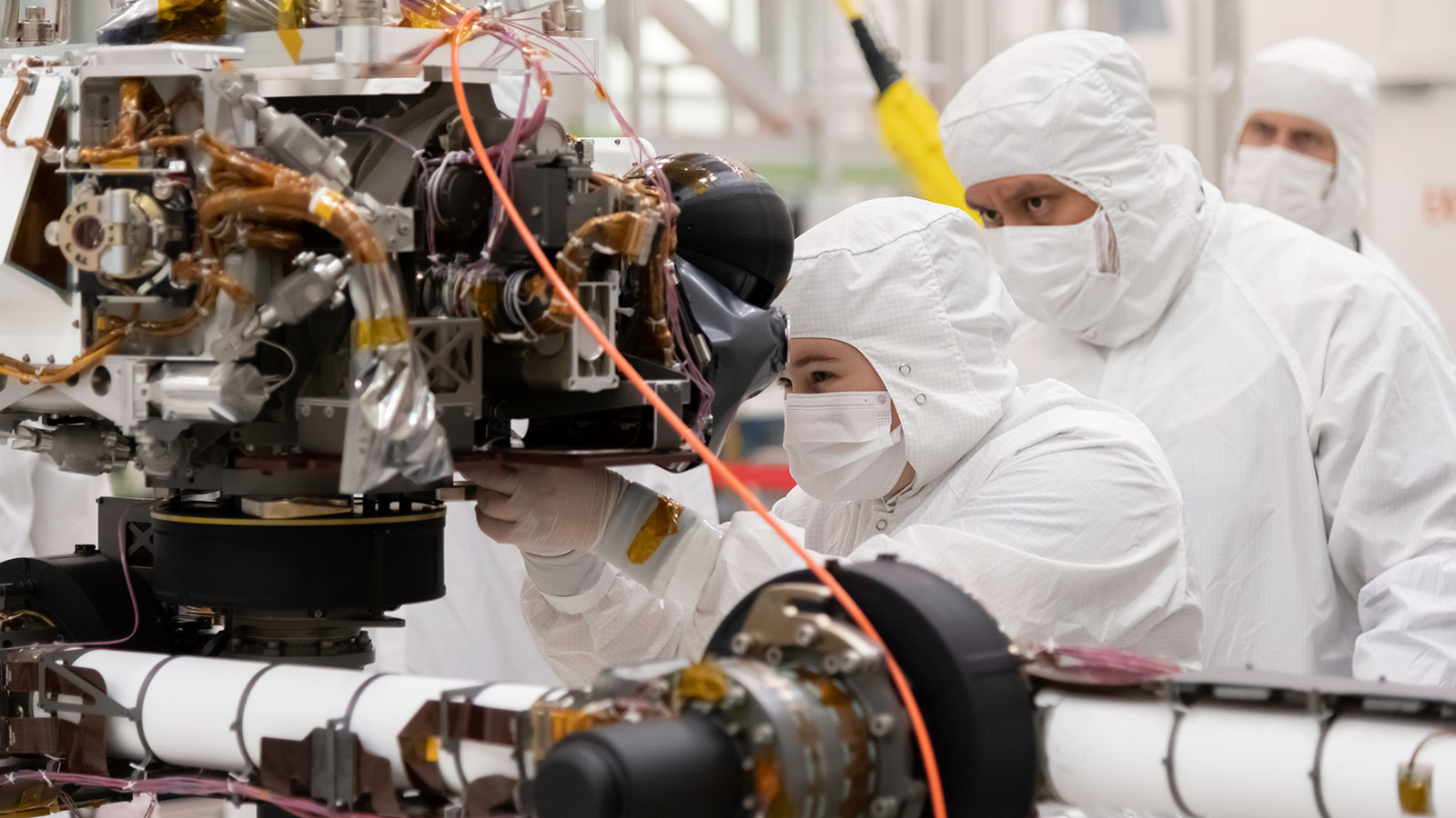 Engineers at JPL install a sensor-filled turret