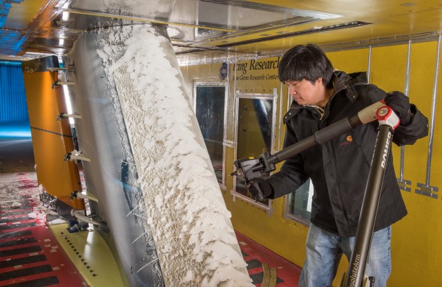 Sam Lee uses 3D laser scanner to measure the ice shape.