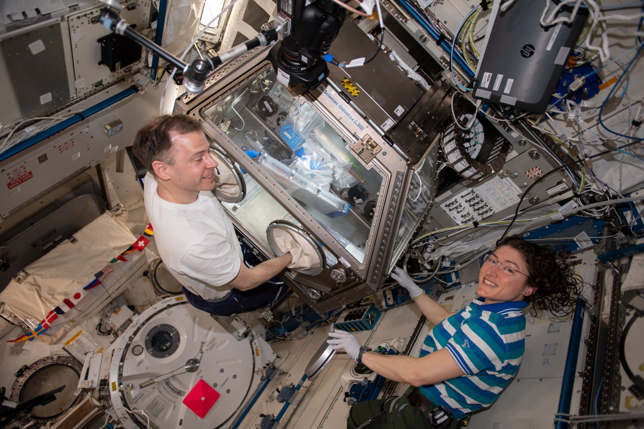 NASA astronauts Nick Hague and Christina Koch conduct the Cell Science-02 