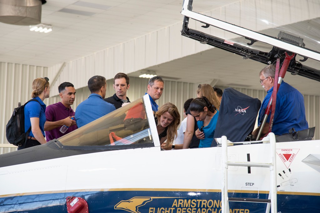 NASA's 2017 astronaut candidates touring an aircraft hangar at Armstrong Flight Research Center, in Southern California.