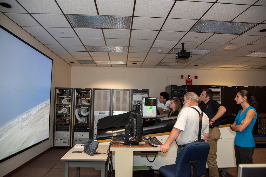 NASA?s 2017 astronaut candidates practice flying in an F-18 aircraft cockpit simulator at AFRC.