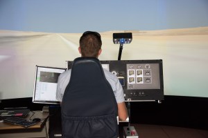NASA's 2017 astronaut candidate Matthew Dominick practices flying in the X-57 aircraft simulator at Armstrong.