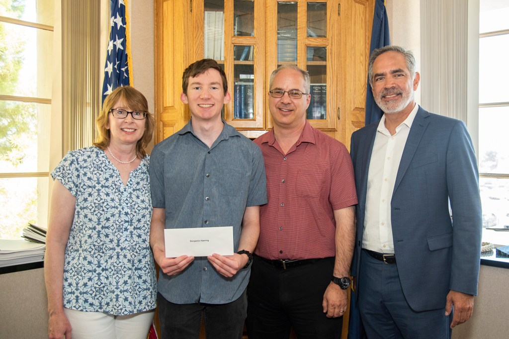 The Employee Exchange Council at AFRC awards scholarship to Ben Haering.