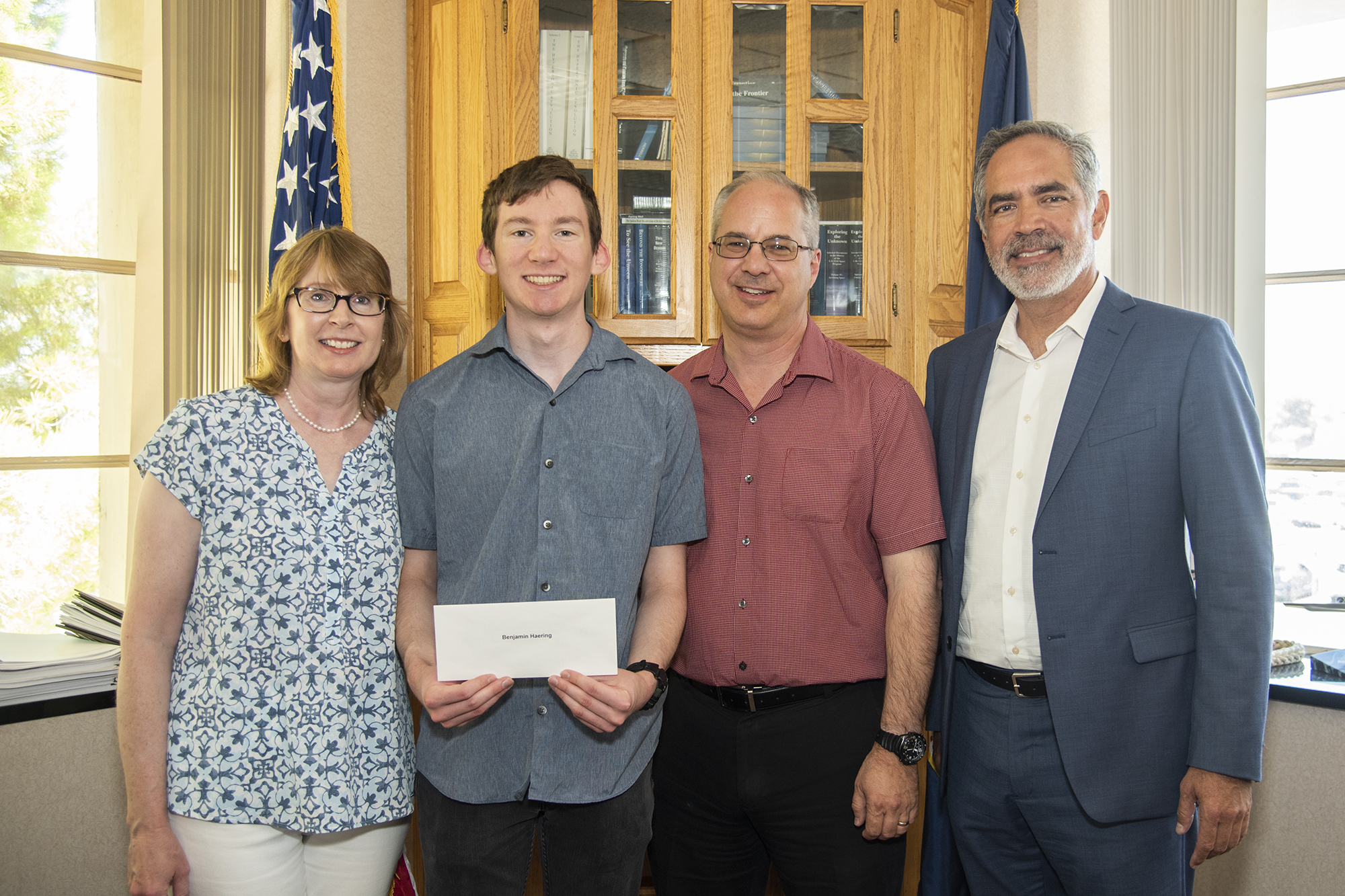 The Employee Exchange Council at AFRC awards scholarship to Ben Haering.