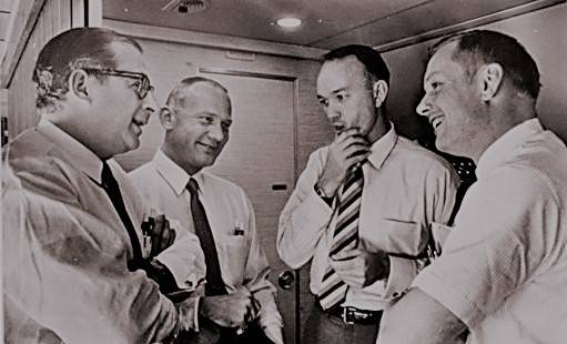 apollo_11_astronauts_and_paine_on_plane_back_to_houston