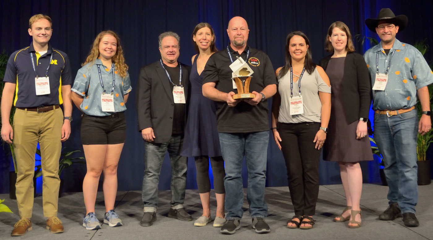 Students and a JPL employee who worked with the MarCO mission