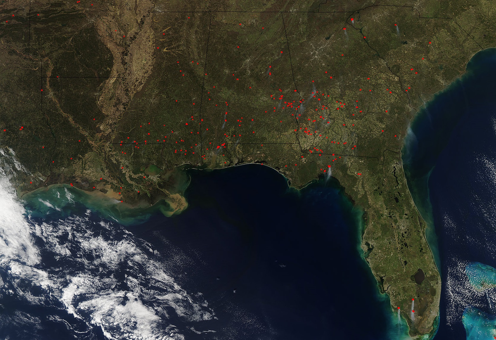 March 2018 image from NASA’s Aqua satellite shows actively burning areas in southeastern U.S. are shown as red dots.