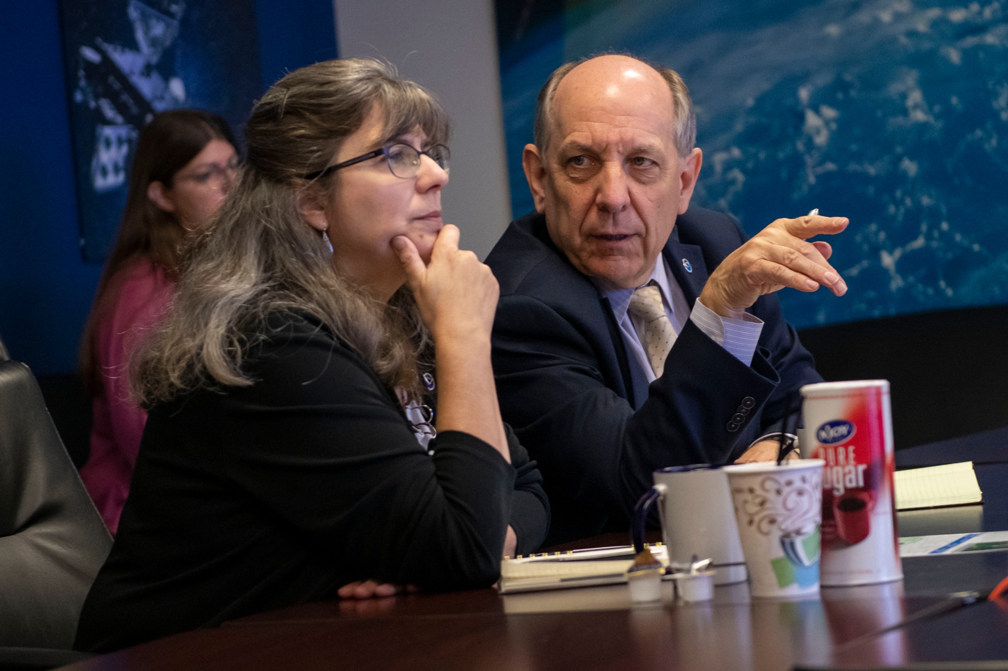National Weather Service Director Louis Uccellini, right, and deputy director Mary Erickson hear from SPoRT team members.