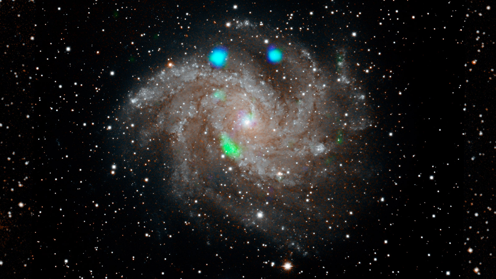 This visible-light image of the Fireworks galaxy (NGC 6946) comes from the Digital Sky Survey, and is overlaid with data from NA