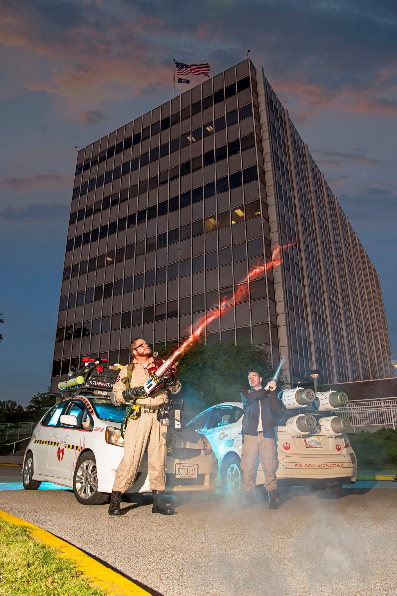 Two men, two cars, 1 building