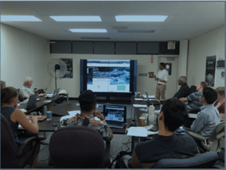 Genki Terauchi from Northwest Pacific Region Environmental Cooperation (NPEC) is presenting his work with the United Nation (UN)
