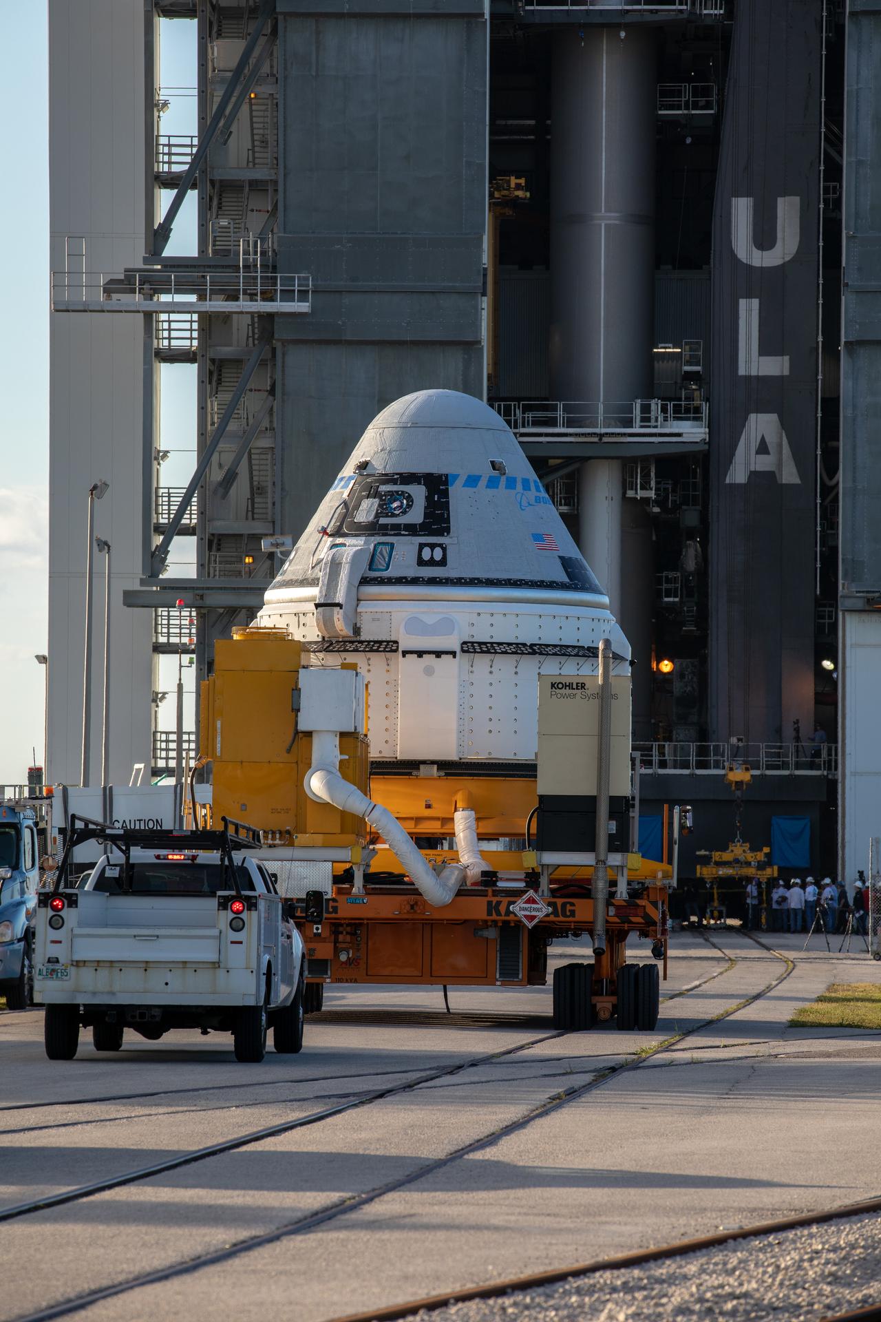 The Boeing CST-100 Starliner spacecraft arrives at the Vertical Integration Facility at Space Launch Complex 41.