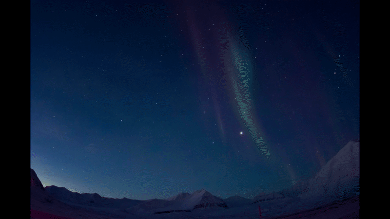 Animated image showing aurora and vapor tracers