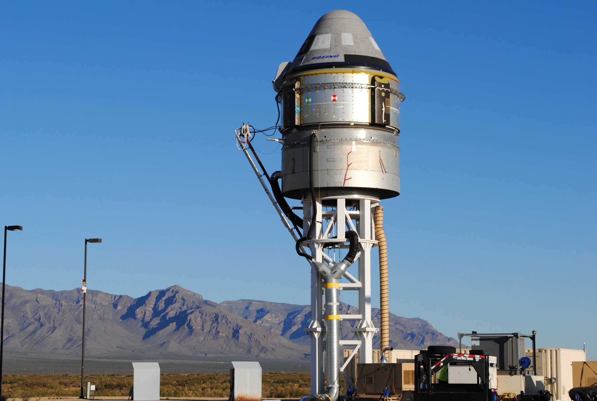 Boeing’s CST-100 Starliner spacecraft and its service module sit atop the test stand at White Sands Missile Range in New Mexico