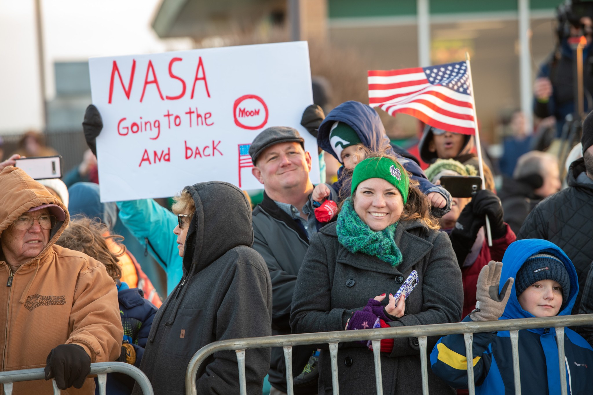 Crowd of people watching NASA's Super Guppy arrival at Mansfield Airport