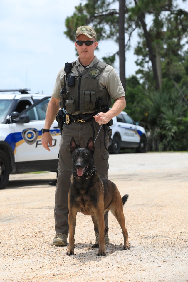 K-9 Spike is ready for the next training exercise with his handler K-9 Officer John McGee.