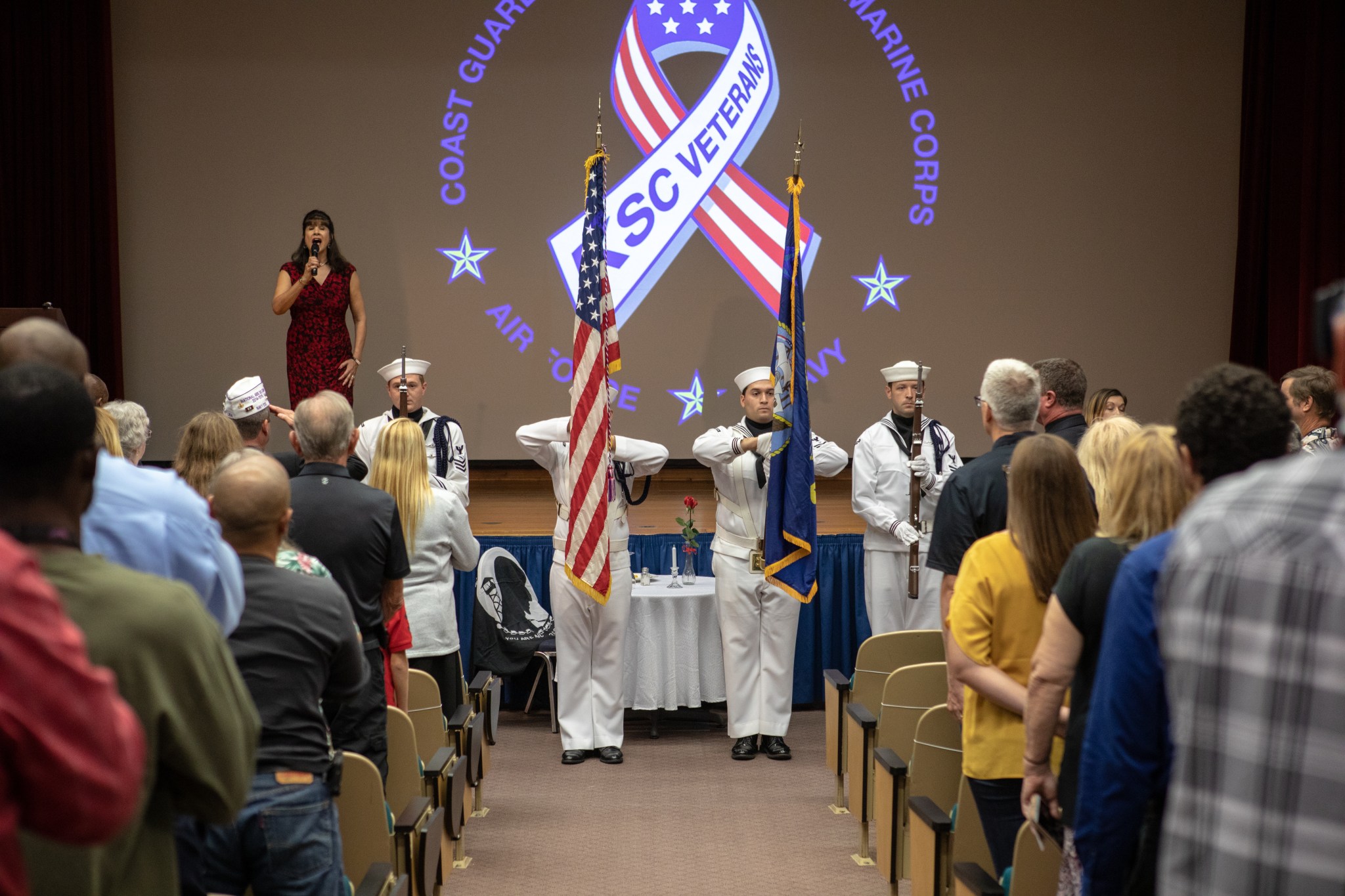 The National Anthem is sung by Suzy Cunningham during a Veterans Day observance ceremony on Nov. 7 in the Training Auditorium.