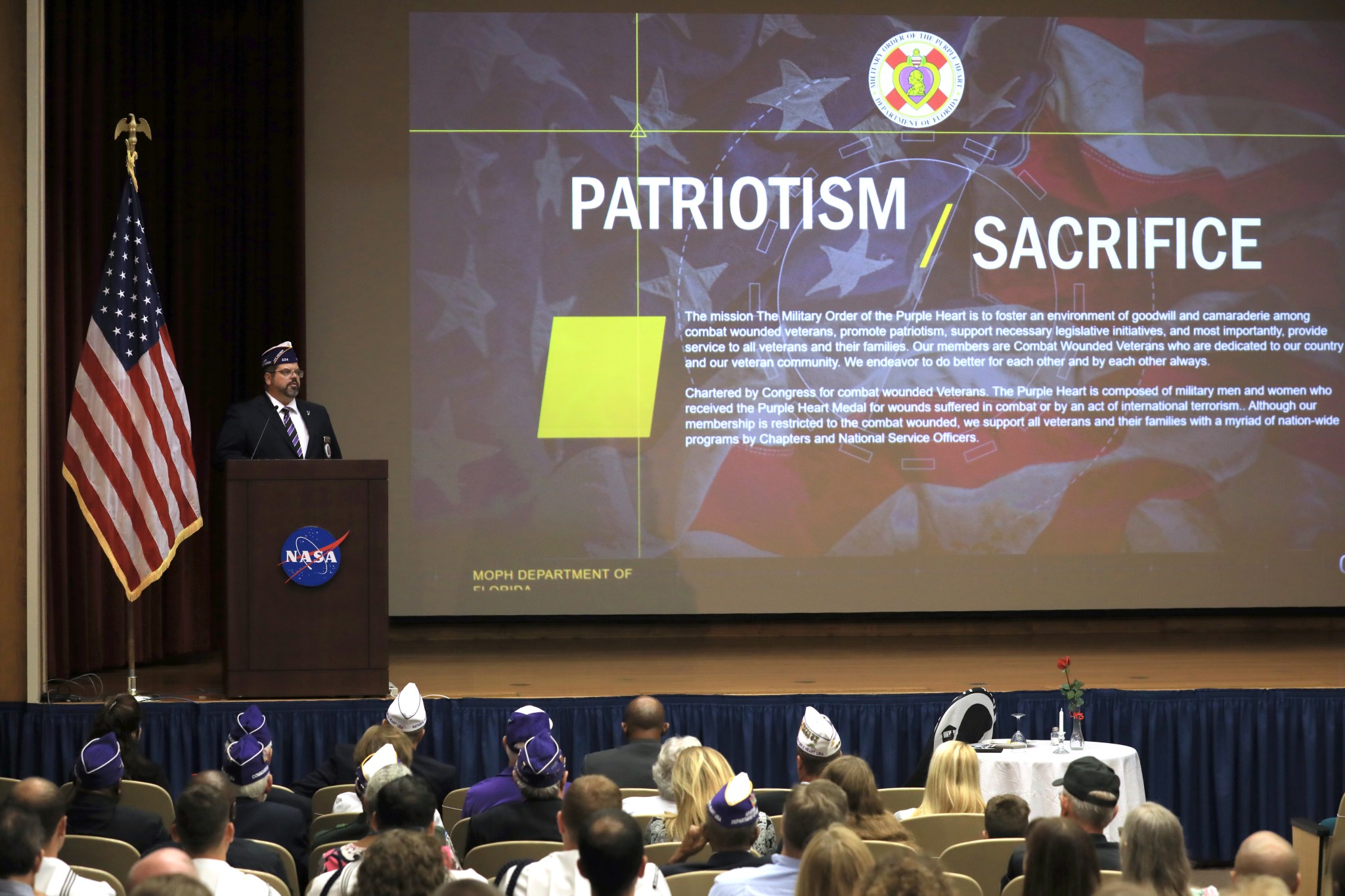 Christopher Vedvick, a combat wounded veteran, speaks at a Veterans Day observance event on Nov. 7, 2019.