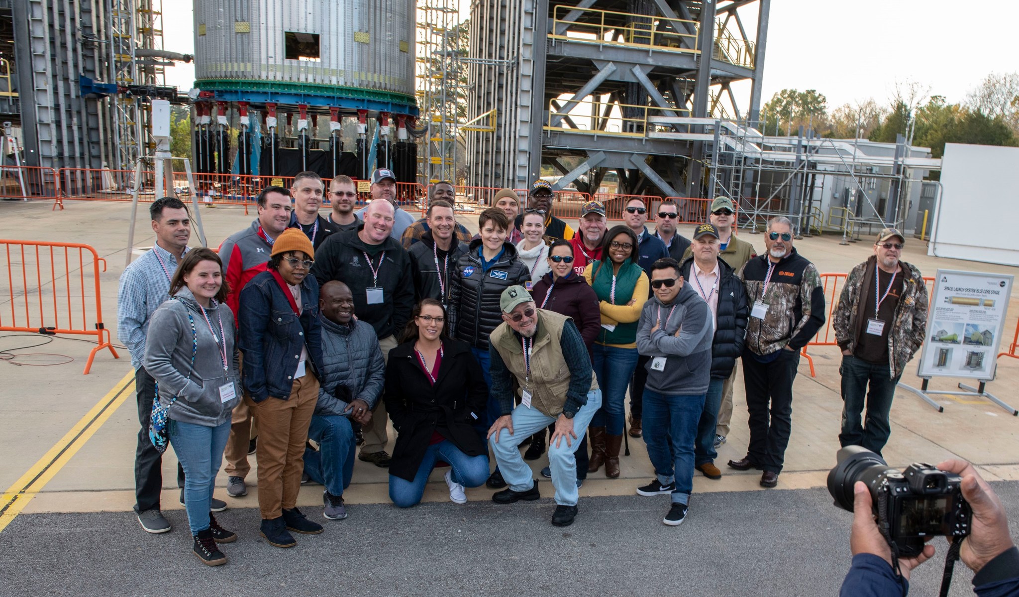 Astronaut Anne McClain, center, and a group of visiting American service veterans tour Marshall Test Stand 4693 on Nov. 8. 