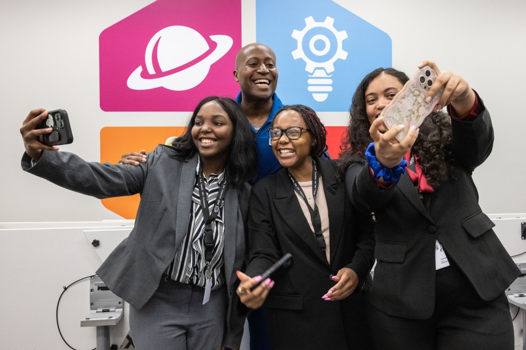 A group of people taking a selfie