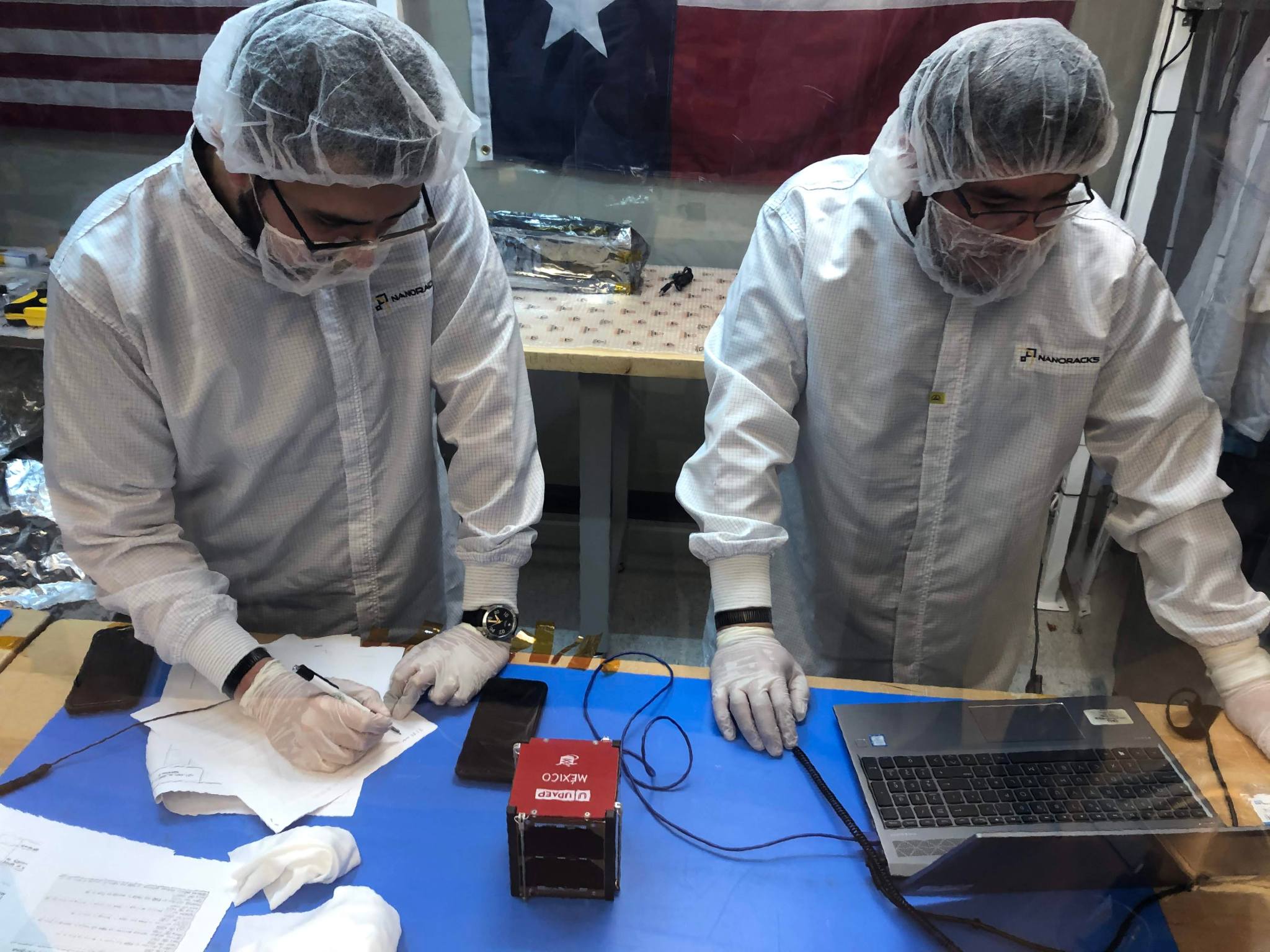 researchers with aztechsat-1 cubesat hardware 