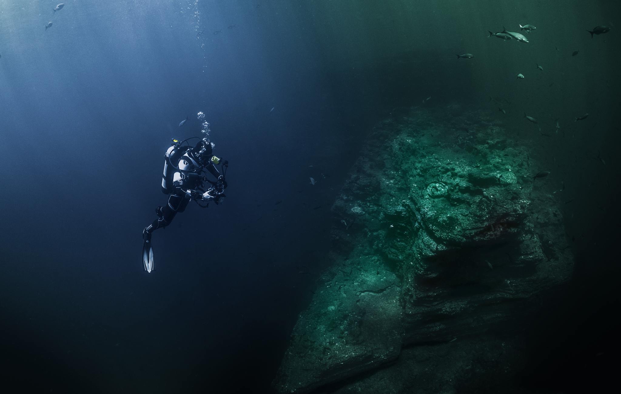 Deep sea diver in the ocean.