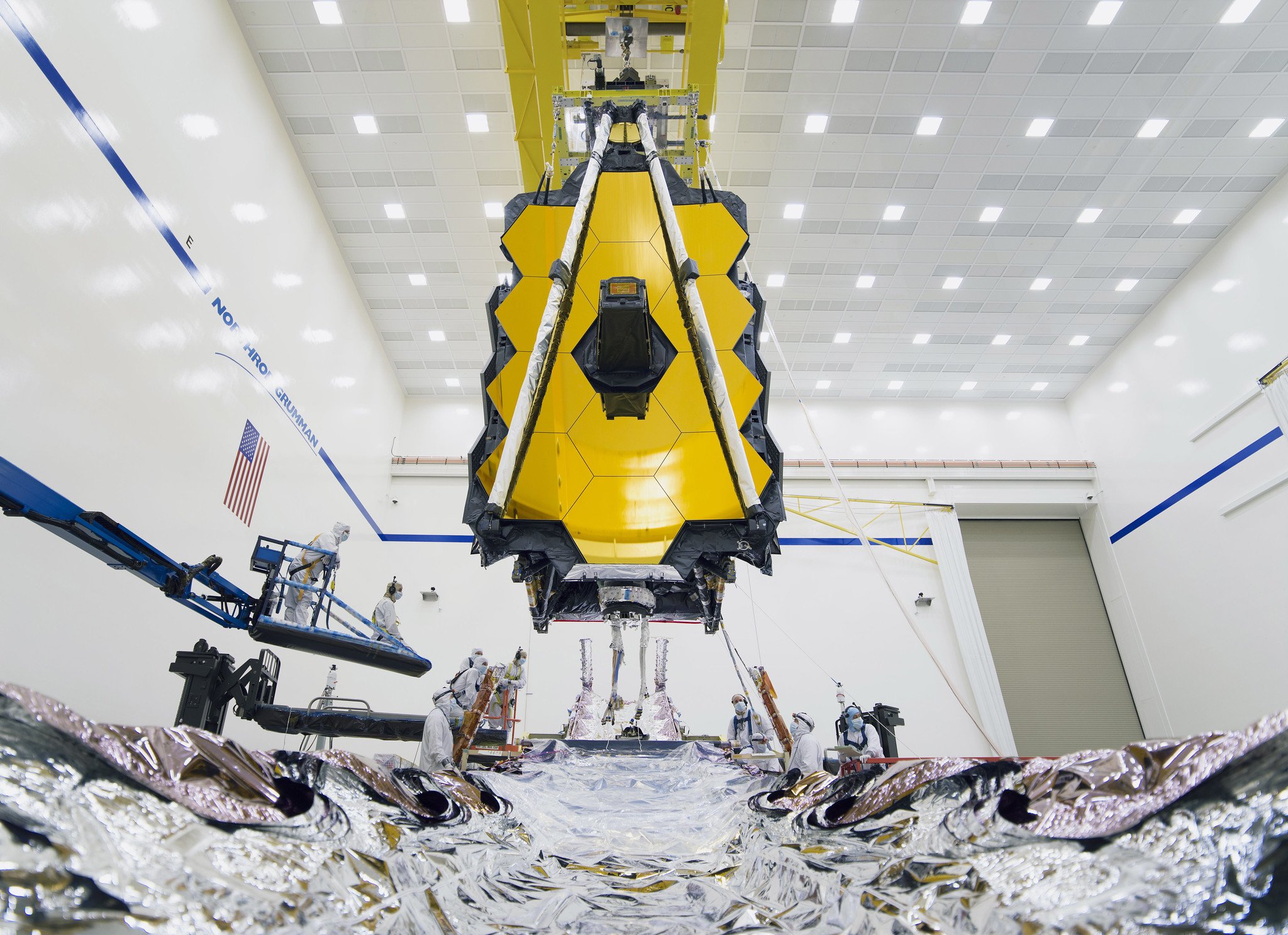 technicians and engineers successfully connect the two halves of NASA’s James Webb Space Telescope