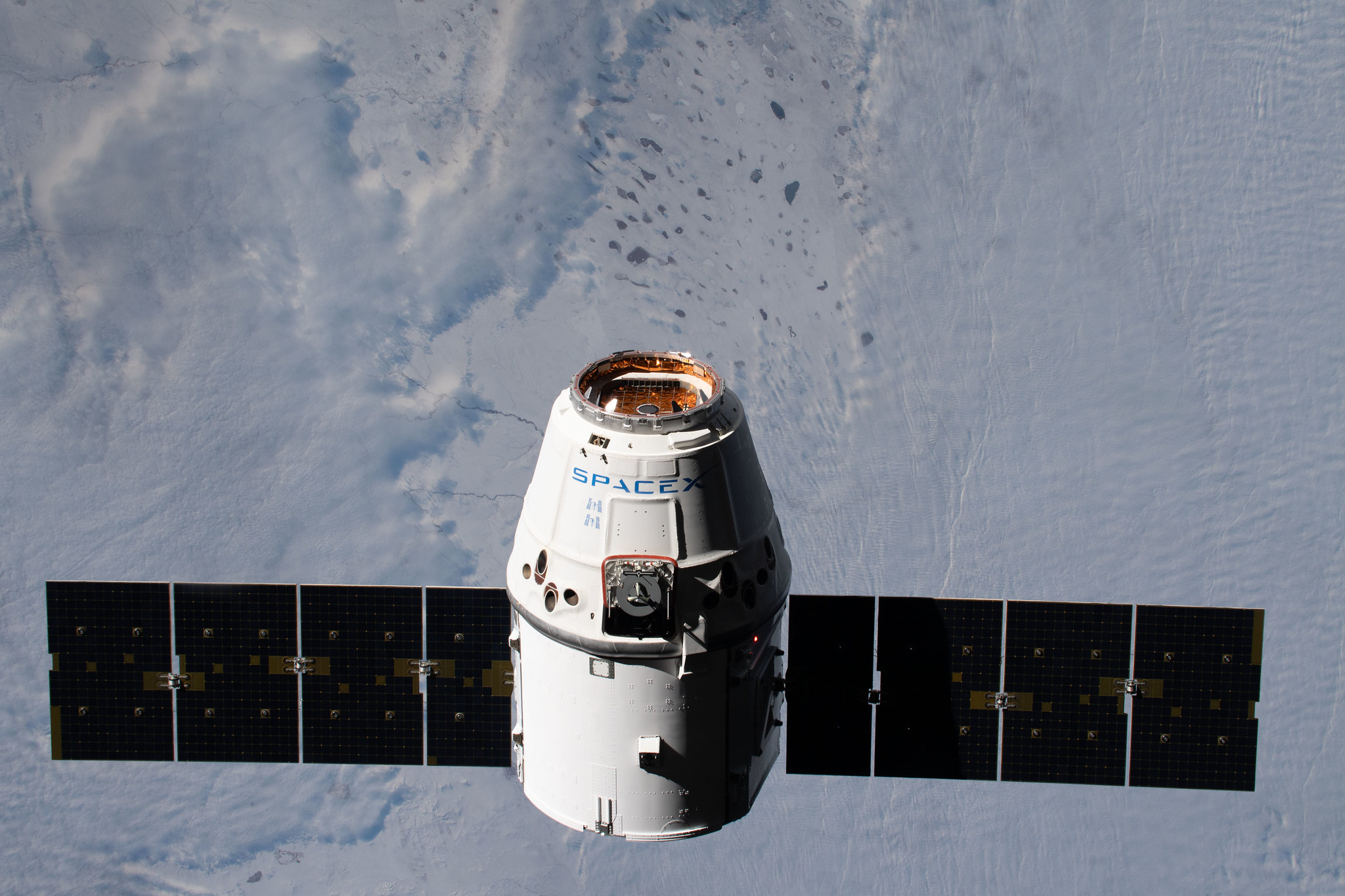 A SpaceX Dragon resupply ship approaches the International Space Station on Dec. 8, 2019.